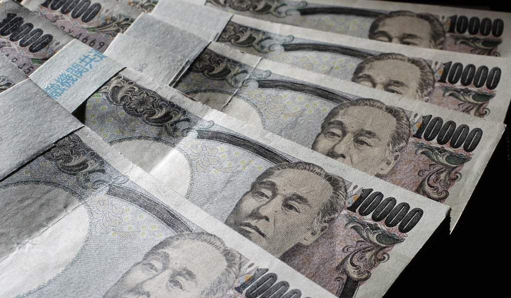 Japanese 10,000 yen bank notes are spread out at an office of World Currency Shop in Tokyo. Photo: Reuters