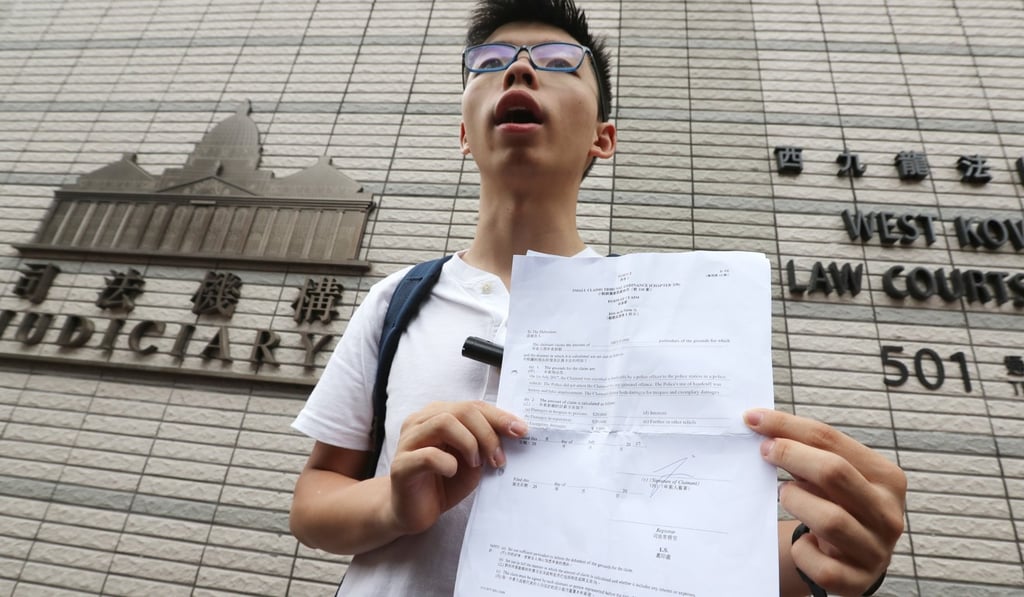 Pro-democracy activist Joshua Wong Chi-fung seeks compensation of 45,000hkd from the police chief, saying that it was unreasonable for policemen to handcuff him after a protest on July 1 at West Kowloon Court. 12JUL17 SCMP/ Edward Wong