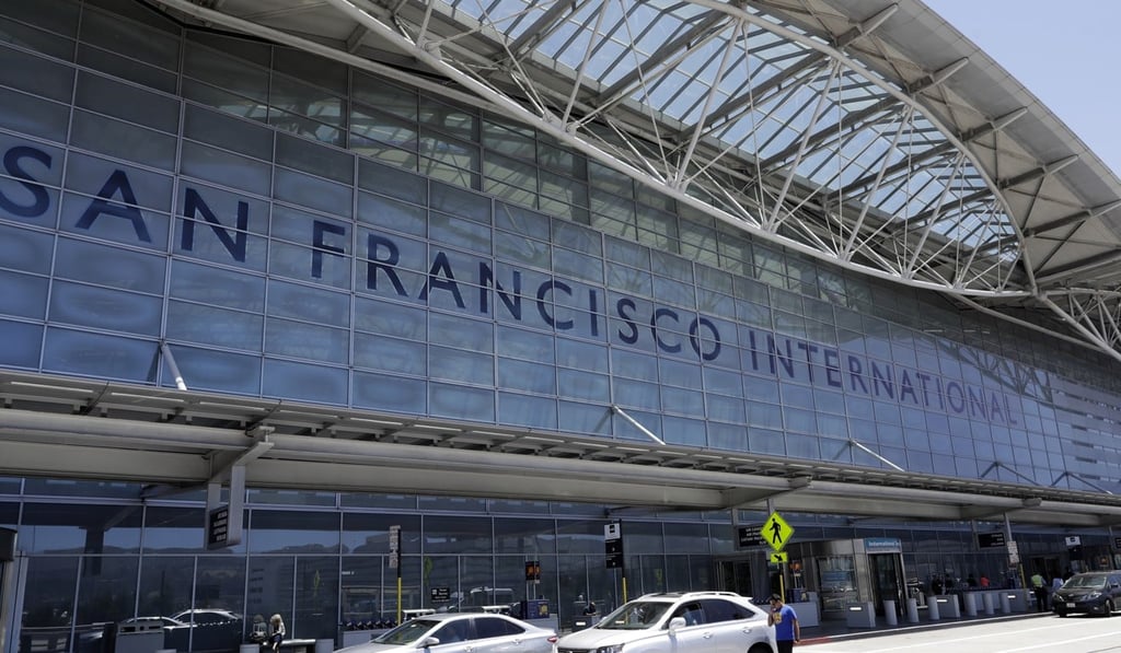 Vehicles wait outside the international terminal at San Francisco International Airport on Tuesday, July 11, 2017, in San Francisco. Federal safety officials are investigating why an Air Canada jet nearly landed on a taxiway last Friday, instead of a runway at the airport. Photo: AP Vehicles wait outside the international terminal at San Francisco International Airport on Tuesday, July 11, 2017, in San Francisco. Federal safety officials are investigating why an Air Canada jet nearly landed on a taxiway last Friday, instead of a runway at the airport. Photo: AP