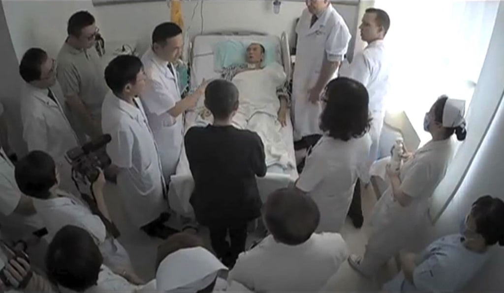 Undated video grab shows Chinese Nobel Laureate Liu Xiaobo surrounded by doctors and his wife Liu Xia at an undisclosed hospital. Photo: AFP