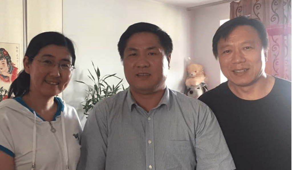 Wang Yu (left) lives under effective house arrest in Inner Mongolia, where her lawyer Wen Donghai (centre) and husband visited her in late June. Photo: Handout
