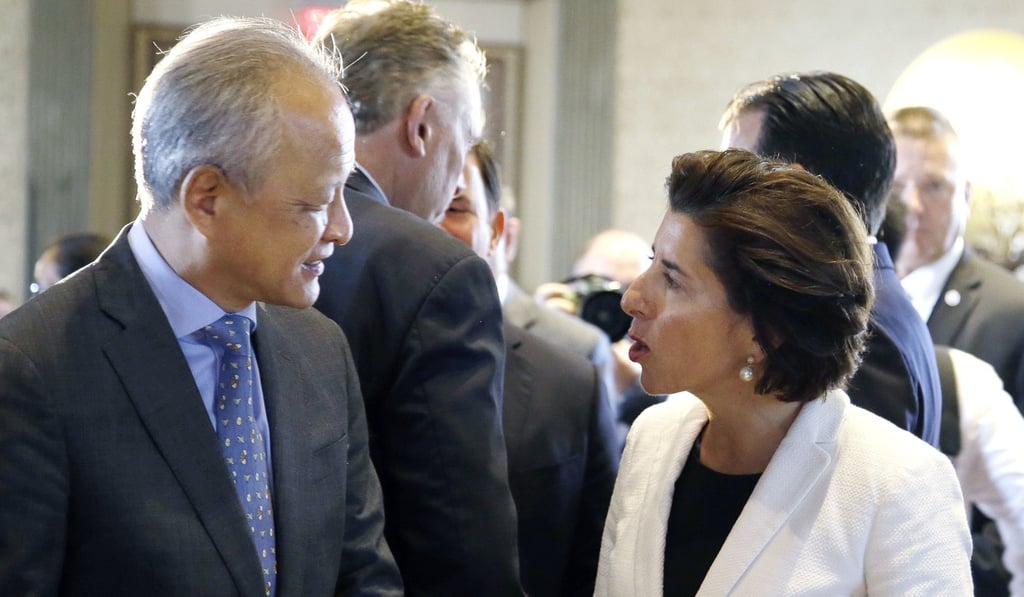 China's Ambassador to the US Cui Tiankai, left, speaks with Rhode Island Governor Gina Raimondo at the China General Chamber of Commerce luncheon on Thursday during the National Governor's Association meeting in Providence, Rhode Island. Photo: Associated Press China's Ambassador to the US Cui Tiankai, left, speaks with Rhode Island Governor Gina Raimondo at the China General Chamber of Commerce luncheon on Thursday during the National Governor's Association meeting in Providence, Rhode Island. Photo: Associated Press