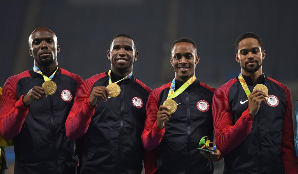 Lashawn Merritt (left), Gil Roberts, Tony McQuay and Arman Hall celebrate on the podium in Rio de Janeiro. Lashawn Merritt (left), Gil Roberts, Tony McQuay and Arman Hall celebrate on the podium in Rio de Janeiro.