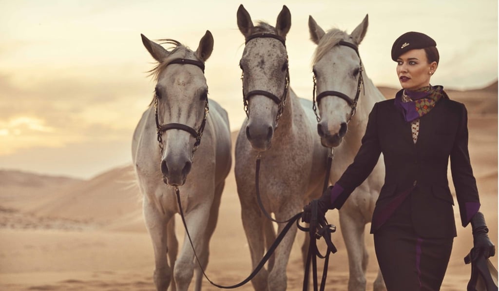 Italian designer Ettore Bilotta makes good use of a chocolate brown suit with regal purple accents. Italian designer Ettore Bilotta makes good use of a chocolate brown suit with regal purple accents.