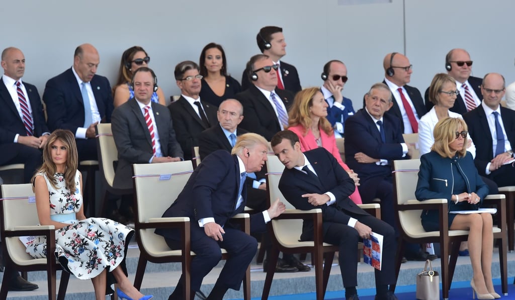 US President Donald Trump talks with his French counterpart Emmanuel Macron during the annual Bastille Day military parade. Photo: AFP US President Donald Trump talks with his French counterpart Emmanuel Macron during the annual Bastille Day military parade. Photo: AFP