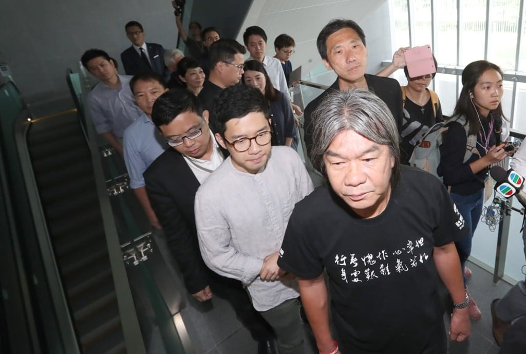 Leung Kwok-hung (front), Nathan Law, Lau Siu-lai and Edward Yiu arrive at the Legislative Council on Saturday. Photo: Edward Wong