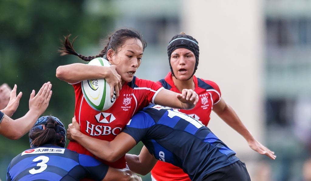Christy Cheng stands up in a tackle as Hong Kong go down to Japan in the Asia Rugby Women's Championship. Christy Cheng stands up in a tackle as Hong Kong go down to Japan in the Asia Rugby Women's Championship.
