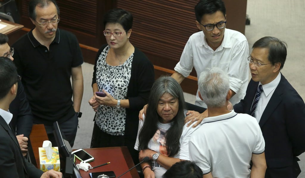 Pan-democrats discuss how to proceed at Friday’s Legco meeting following the disqualification of four of their lawmakers. Photo: Sam Tsang