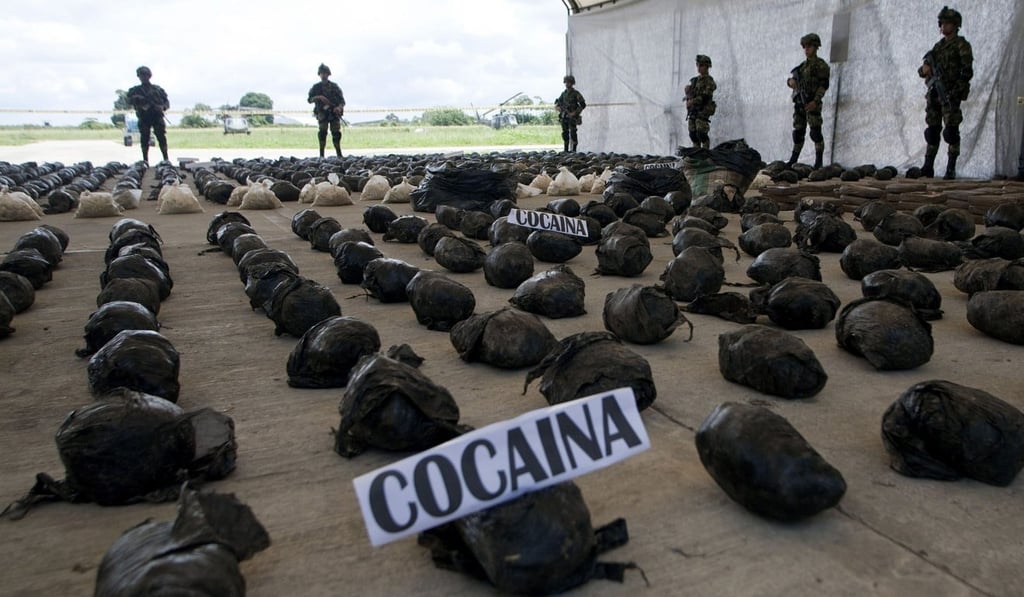 Colombian Navy soldiers present a cocaine seizure. Photo: EPA