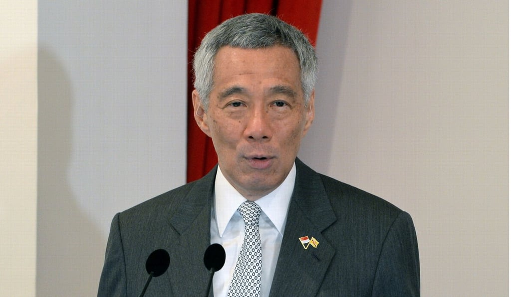 Lee Hsien Loong speaking at the Istana presidential palace in Singapore. Photo: AFP Lee Hsien Loong speaking at the Istana presidential palace in Singapore. Photo: AFP