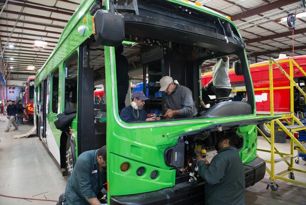 Assembly workers at BYD’s factory in Lancaster, California, putting together a battery powered bus in April. BYD, entrepreneur Wang Chuanfu’s Shenzhen-based company, had been operating the Lancaster factory since 2013, with 560 workers on staff. Photo: XInhua.