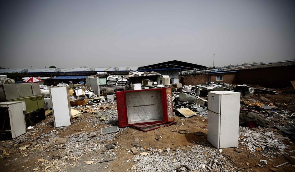 Broken fridges ready for recycling in Beijing. The market for such appliances in China has matured, and people only tend to buy them on a replacement basis now. Photo: Reuters