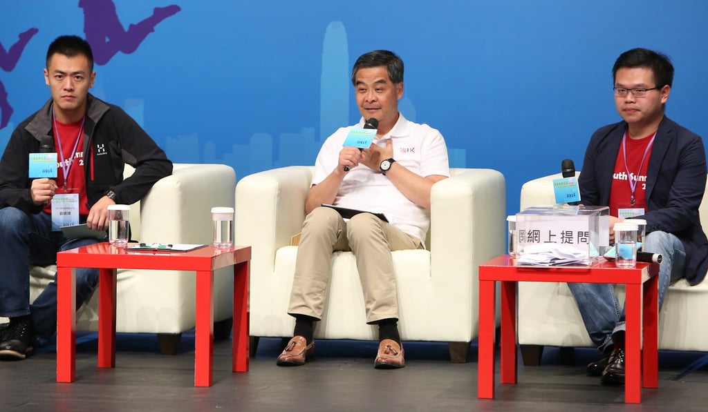 Then chief executive Leung Chun-ying (centre) addresses participants at the Youth Summit 2016, as Lau Ming-wai (left), the Commission of Youth chair, and summit convenor Alex Fan look on, at Youth Square in Chai Wan last November 26. Photo: Edmond So