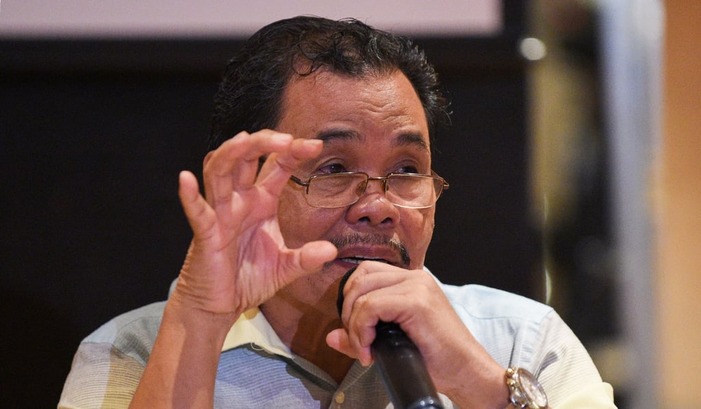 MILF peace panel chairman Mohagher Iqbal at the signing ceremony. Photo: AFP
