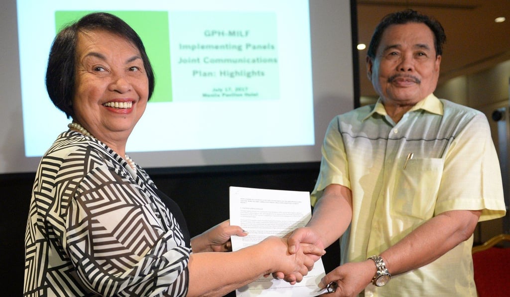 Irene Santiago, chair of Philippine government's Implementing Panel for the Bangsamoro peace accords Iqbal after the signing ceremony. Photo: AFP