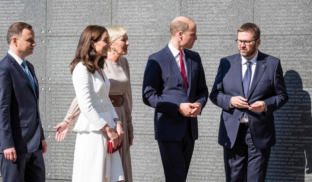 Britain's Prince William, Duke of Cambridge (2nd R), Britain's Catherine, Duchess of Cambridge (2nd L) visits the Warsaw Uprising Museum with Polish President Andrzej Duda (L) and his wife Agata (C), as they are shown around by Museum director Jan Oldakowski (R) in Warsaw, Poland on July 17, 2017. Photo: AFP