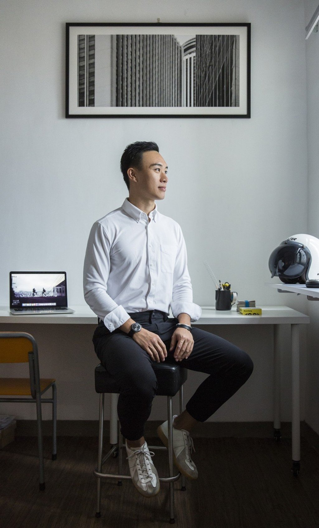 At work, Yau rocks a smart, casual look. The top is from Uniqlo, while the pants are from Lululemon. Photo: Michelle Wong