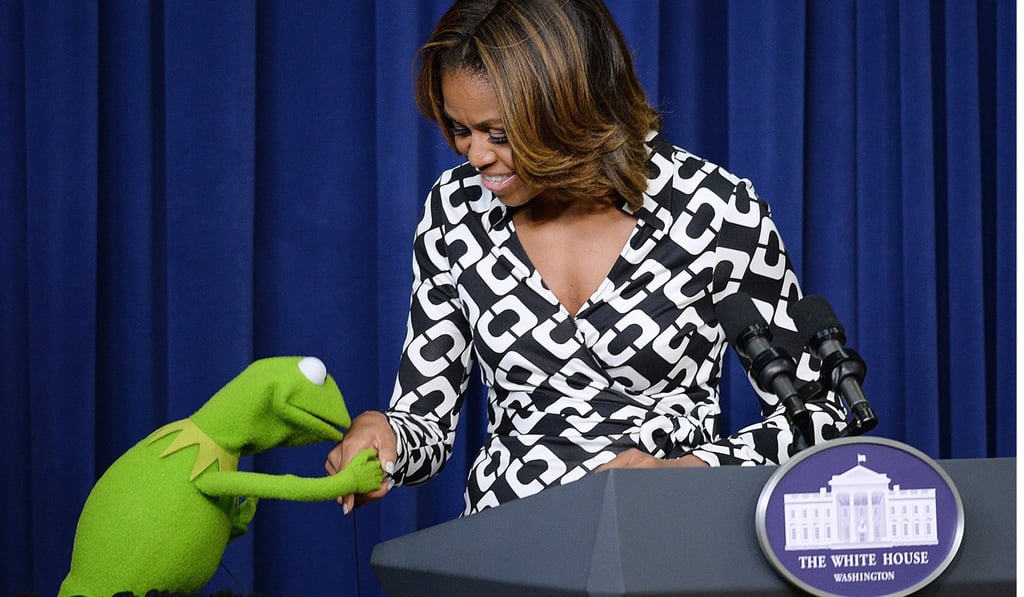 Former US first lady Michelle Obama welcomes Kermit the Frog to the White House in 2014. Photo: MCT