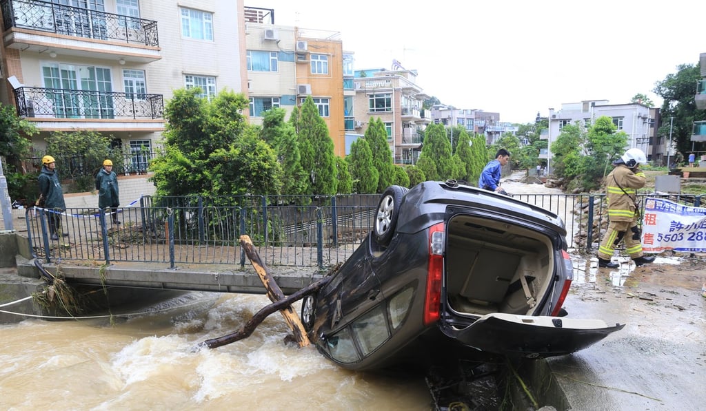 A vehicle lies overturned in Tai Mei Tuk, Tai Po, after heavy rain. Photo: Handout.