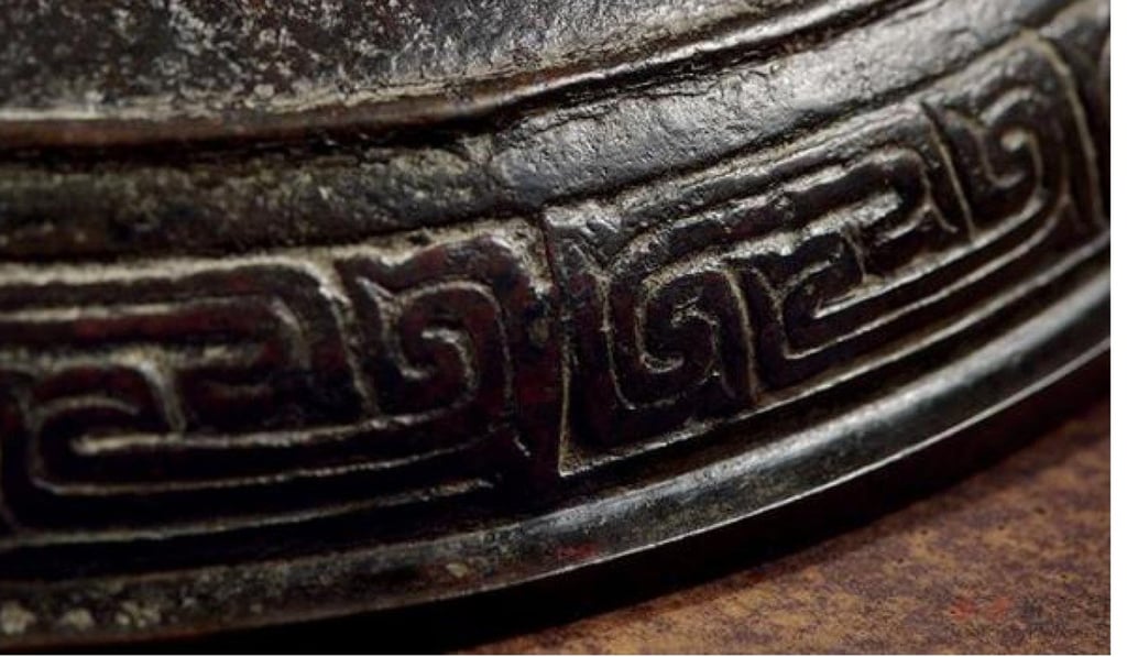 Decorative markings on the rim of the piece. Photo: Handout