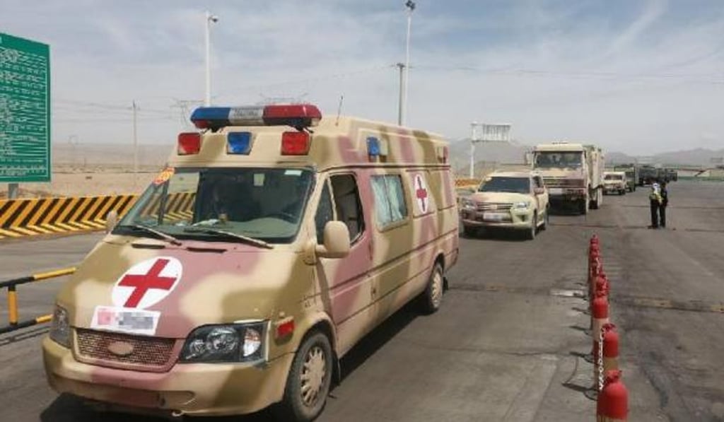 A medical van waits at a checkpoint. Photo: Handout