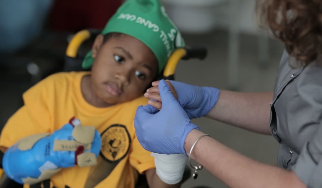 A 2015 file photo provided by the Children's Hospital of Philadelphia in Pennsylvania shows a nurse checking the newly transplanted hands of eight-year-old Zion Harvey of Baltimore. Photo: AFP A 2015 file photo provided by the Children's Hospital of Philadelphia in Pennsylvania shows a nurse checking the newly transplanted hands of eight-year-old Zion Harvey of Baltimore. Photo: AFP