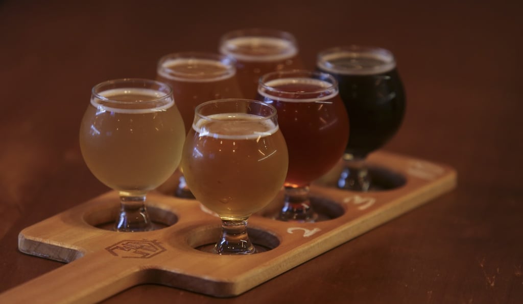 Zhang Men’s house platter lets you sample a selection of the bar’s 24 draught beers. Photo: Xiaomei Chen