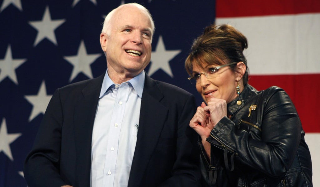 US Senator John McCain and running mate Sarah Palin acknowledge the crowd during a 2008 campaign rally in Tucson, Arizona. Photo: Reuters