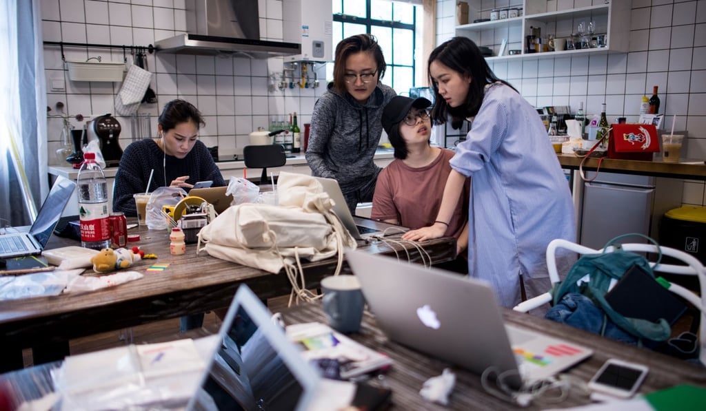 Employees of the e-commerce startup gogoand working on their website in Shanghai. Photo: AFP