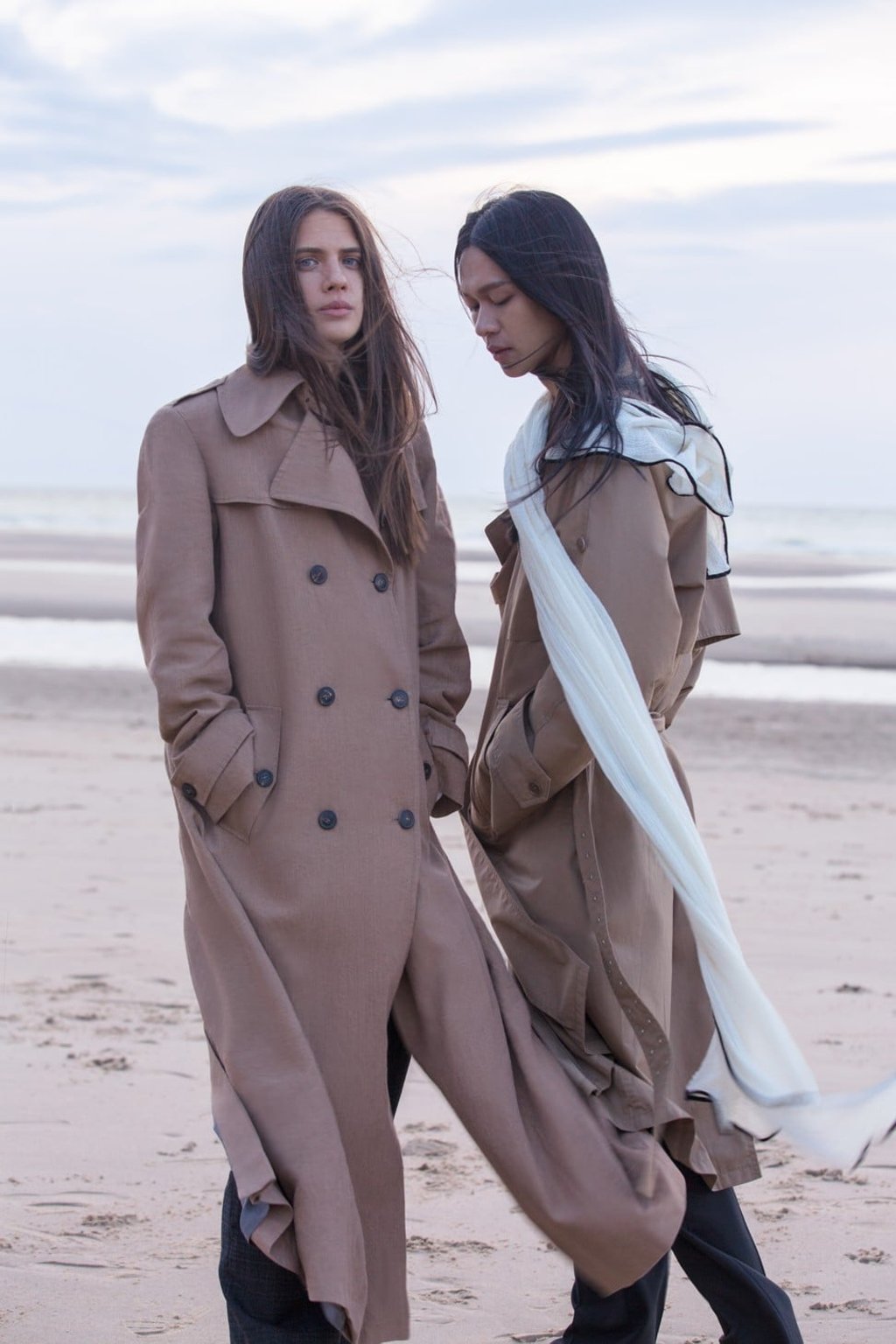 ON AXELLE (LEFT): DRIES VAN NOTEN, trench coat, HK$10,700. LANVIN HOMME, trousers, price on request. ON DARELL: MAISON MARGIELA, trench coat, HK$18,120. LANVIN HOMME, trousers, price on request. AMBAS, scarf, HK$580.