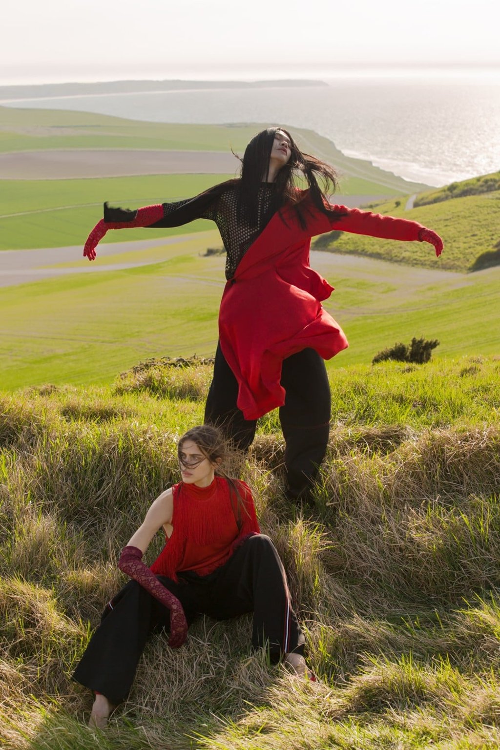ON DARELL (TOP): DIOR HOMME, sweater, HK$14,500. YOHJI YAMAMOTO FEMME, jacket, HK$19,970. DIOR HOMME, trousers. Price on request. AGNELLE, lace gloves, HK$910. ON AXELLE: GIVENCHY, jersey dress, HK$22,900. DIOR HOMME, trousers, HK$12,000. VALENTINO, pumps, HK$8,700. AGNELLE, lace gloves, HK$910.