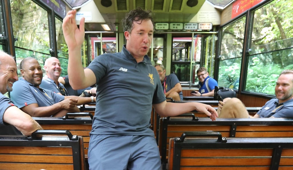Liverpool great Robbie Fowler rides the tram to The Peak. Photo: Dickson Lee