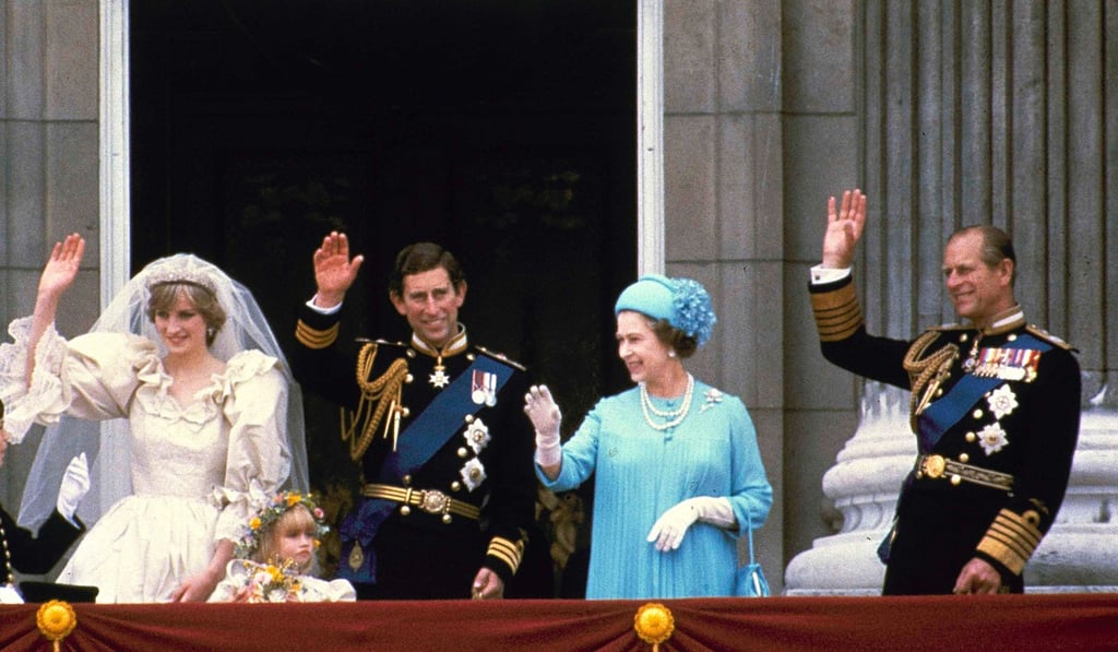 The royal family wave from the balcony at Buckingham Palace after the wedding ceremony at St Paul’s Cathedral. Picture: AP