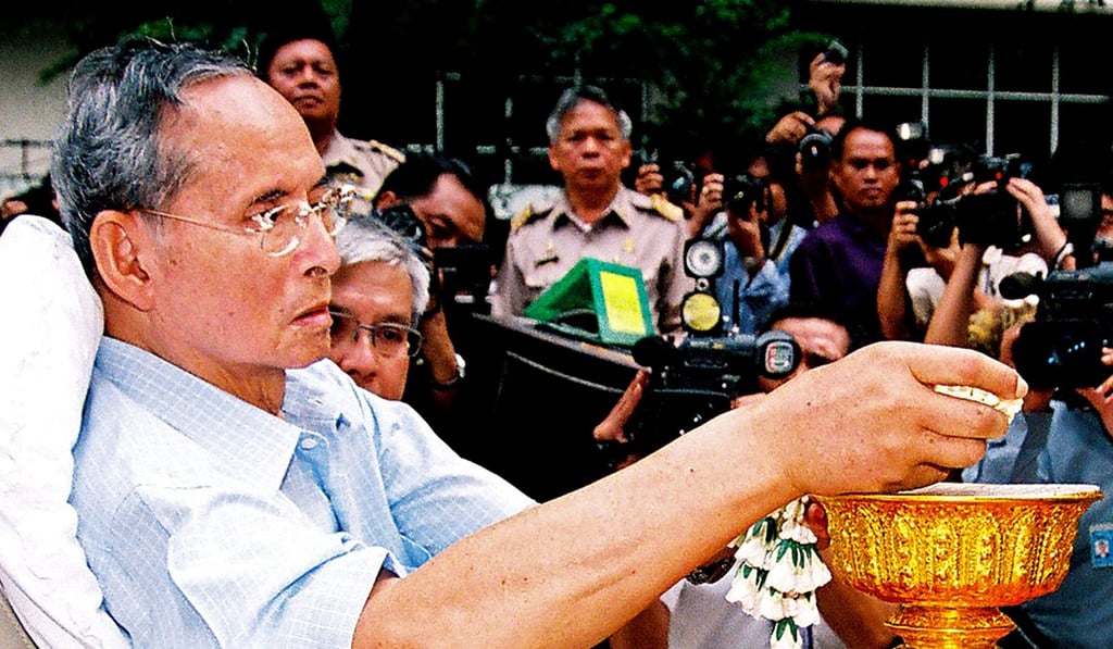 Thai King Bhumibol Adulyadej makes an appearance at a hospital in Bangkok in 2009. The king died in October 2016. Photo: AFP