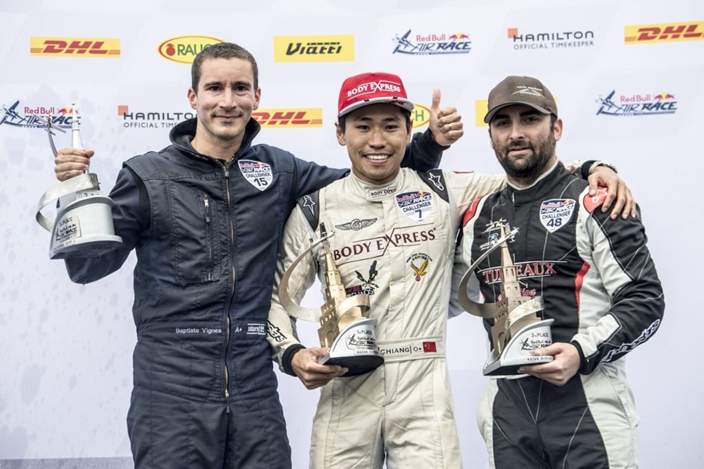Hong Kong’s Chiang on the podium after winning the Kazan leg of the Air Race World Championship Challenger Class. Baptiste Vignes finished second and Kevin Coleman third. Hong Kong’s Chiang on the podium after winning the Kazan leg of the Air Race World Championship Challenger Class. Baptiste Vignes finished second and Kevin Coleman third.