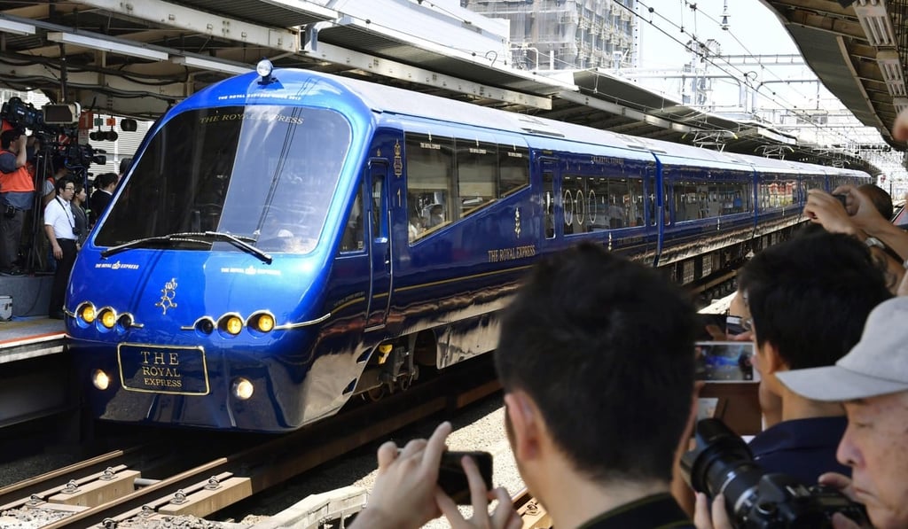 The Royal Express as it departs JR Yokohama Station. Photos: Kyodo The Royal Express as it departs JR Yokohama Station. Photos: Kyodo