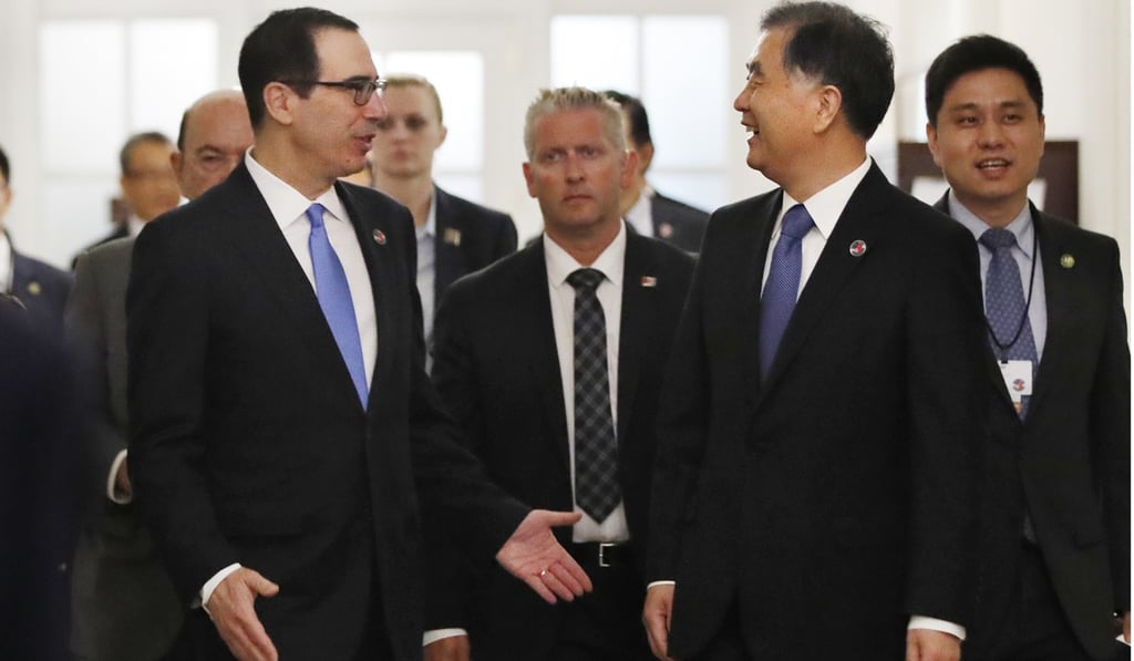 US Treasury Secretary Steve Mnuchin and Chinese Vice-Premier Wang Yang arrive for the US-China Comprehensive Economic Dialogue in Washington, on July 19. Photo: AP US Treasury Secretary Steve Mnuchin and Chinese Vice-Premier Wang Yang arrive for the US-China Comprehensive Economic Dialogue in Washington, on July 19. Photo: AP