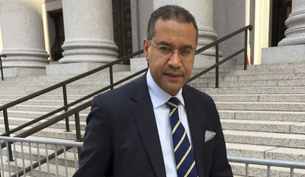 In this July 19 photo, suspended Dominican Republic diplomat Francis Lorenzo leaves Manhattan federal court in New York, after giving over a week's worth of testimony in the United Nations bribery trial of billionaire Ng Lap-seng. Photo: AP In this July 19 photo, suspended Dominican Republic diplomat Francis Lorenzo leaves Manhattan federal court in New York, after giving over a week's worth of testimony in the United Nations bribery trial of billionaire Ng Lap-seng. Photo: AP