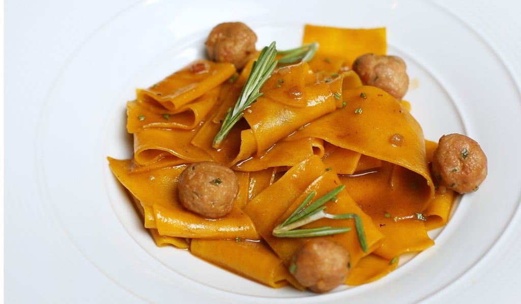 Ammo’s papparedelle with veal and pork meatballs and Parmesan cheese.