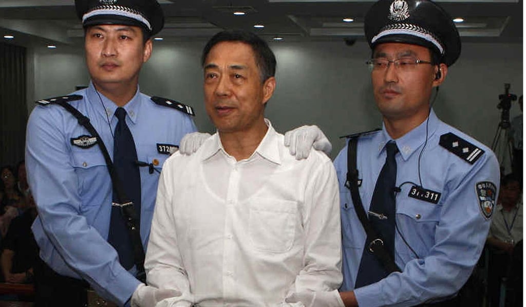 Bo Xilai stands in a courtroom in Jinan, east China's Shandong province, in 2013. The fallen Chinese political star was sentenced to life in prison on graft and abuse of power charges. Photo: AFP