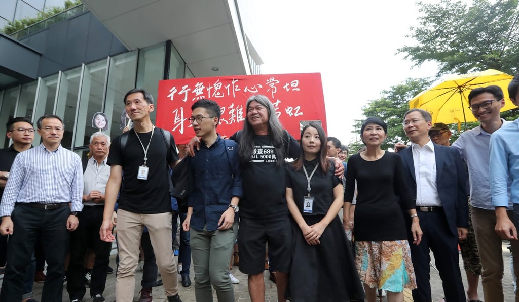 The pan-democrats put on a united front outside the Legislative Council. Photo: Edward Wong