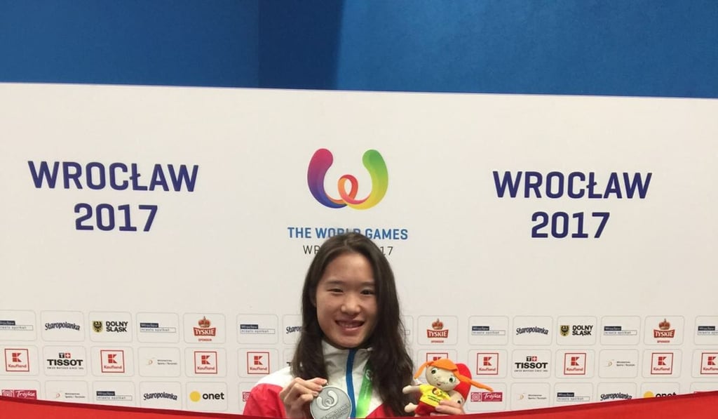 Joey Chan shows off her medal. Photo: Handout