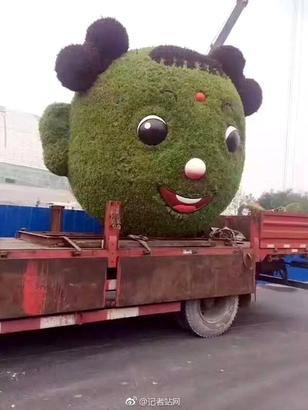 The jolly green statue is dismantled and hauled off site. Photo: Handout The jolly green statue is dismantled and hauled off site. Photo: Handout