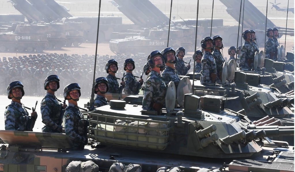 The huge display of military hardware also featured 12,000 troops. Photo: Xinhua