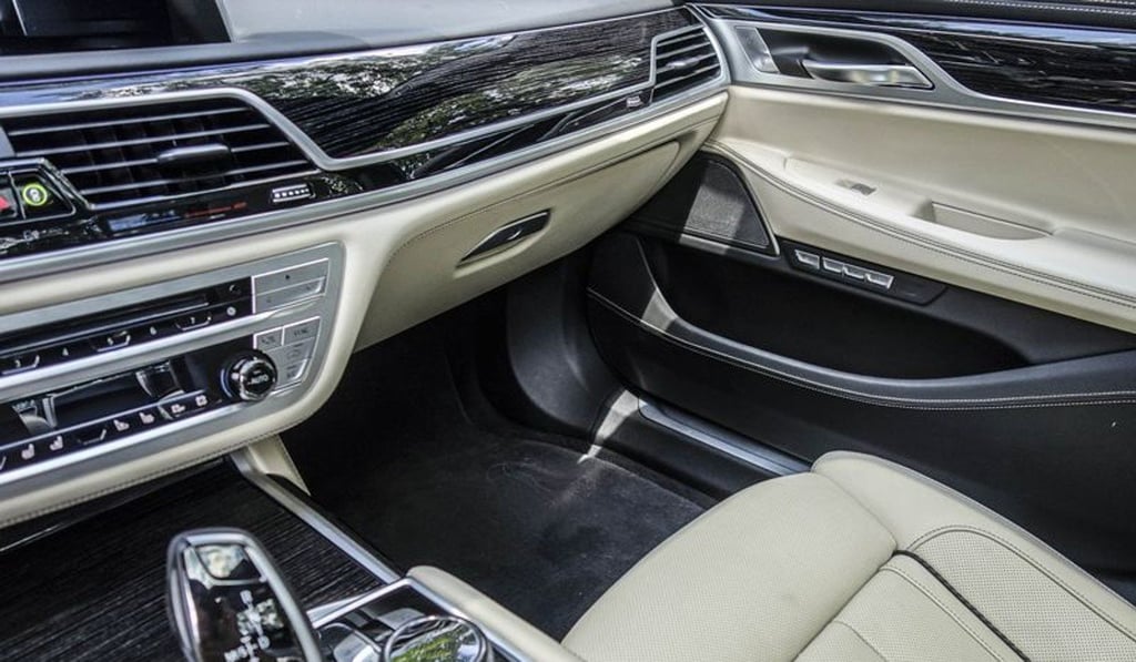 The four-door sedan comes with seating for four or five people, depending on which configuration you choose. The four-door sedan comes with seating for four or five people, depending on which configuration you choose.