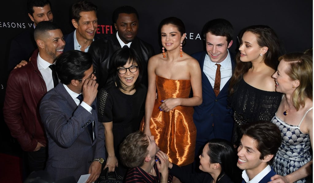 This file photo taken on March 30 shows actress/singer Selena Gomez (centre) surrounded by cast members as they arrive for the premiere of Netflix's '13 Reasons Why' at Paramount Pictures Studio in Los Angeles. Gomez is executive producer of the show. Photo: AFP