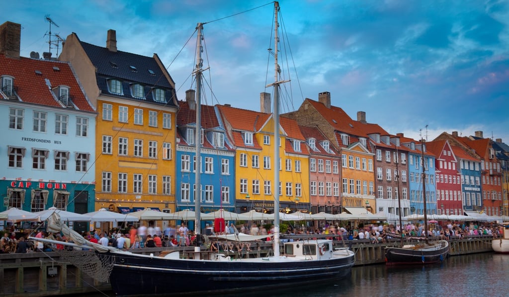 Nyhavn is the colourful 17th century waterfront, canal and popular entertainment district in Copenhagen. Photo: Alamy Stock Photo