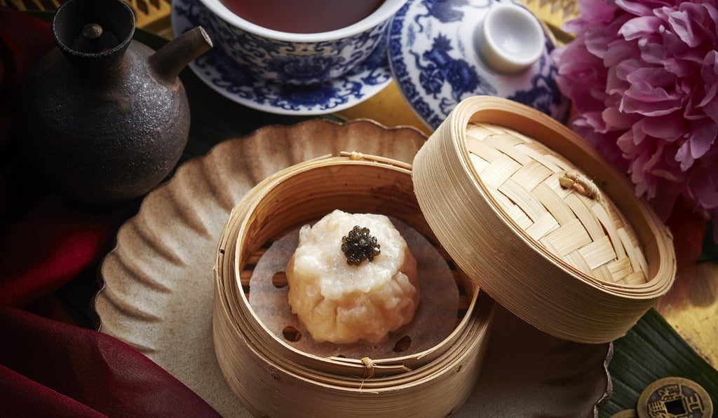 Soft-boiled quail egg and pork dumpling with shrimp broth and caviar.