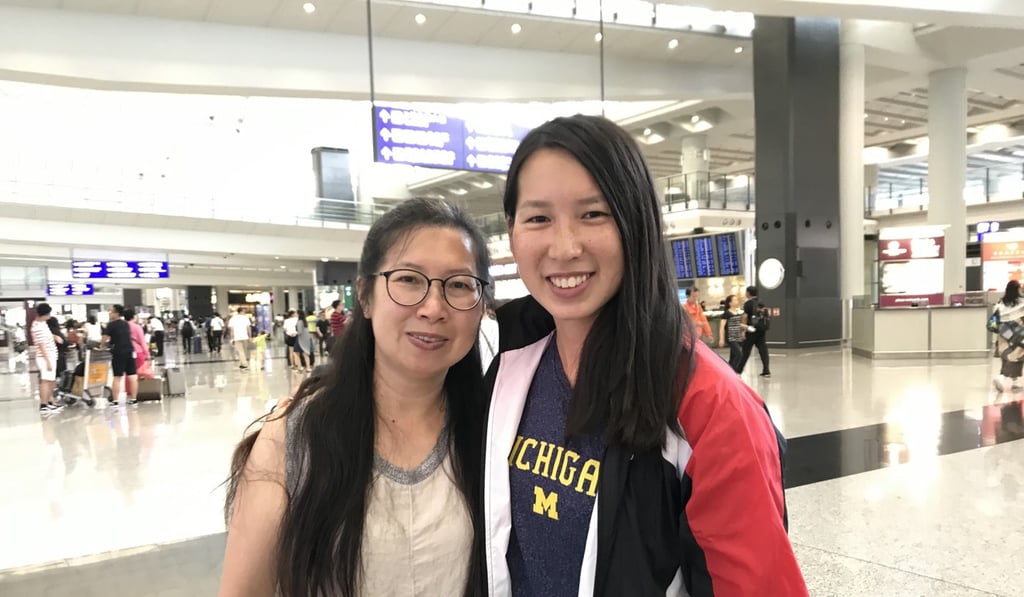 Claudia Lau with her mother at Hong Kong International Airport. Photo: Chan Kin-wa