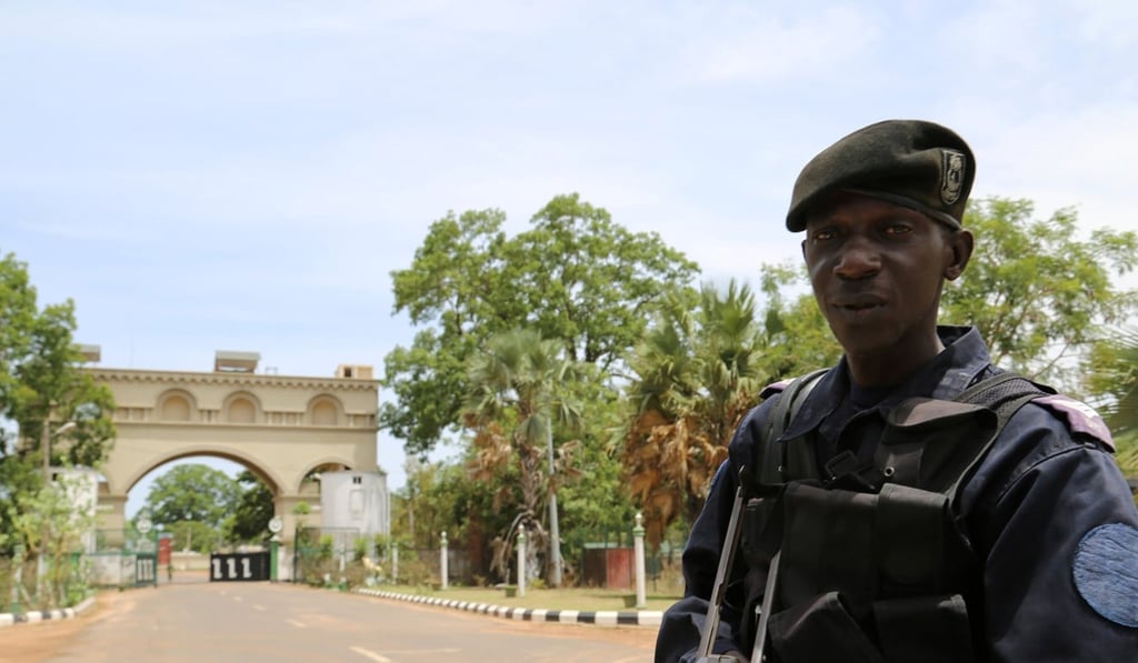 A soldier pictured in front of the entrance to former Gambian president Yahya Jammeh’s estate in Kanilai. Photo: Reuters